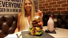 Woman Destroys 28 Ounce Burger Under 10 Minutes